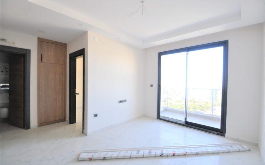 1+1 unfurnished apartment for sale in Mahmutlar